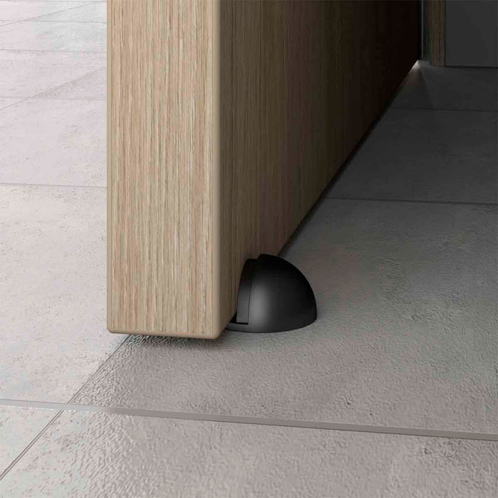 Tope para puerta media luna fijado al piso