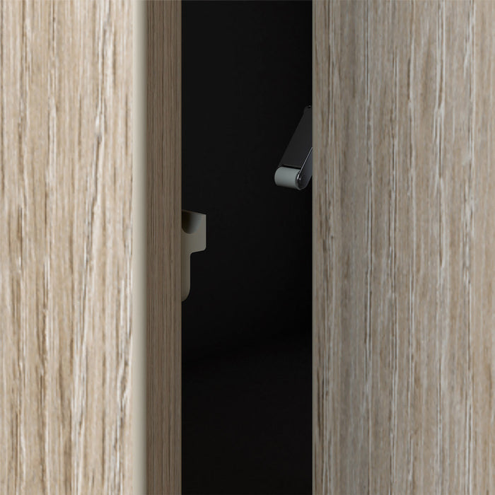 Dispositivo push to open con enganche uña