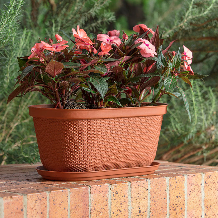 Matera ovalada rafia 40 cm con plato Rimax